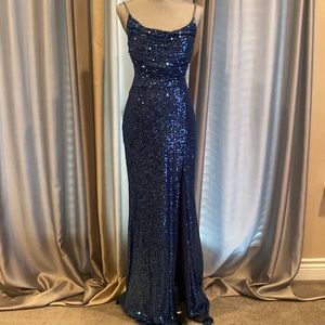 Lapis blue sequin gown with lace up back. Size L